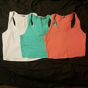 Three Imagenation crop tops